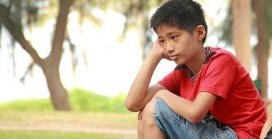 Niño con depresión